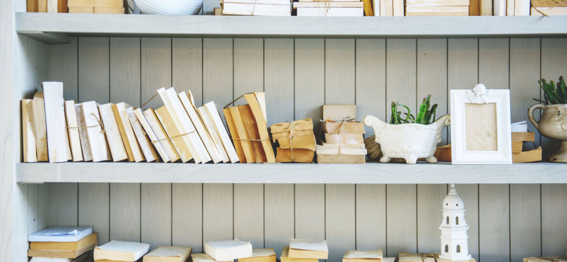 Book Shelf with Stack of No Cover Books